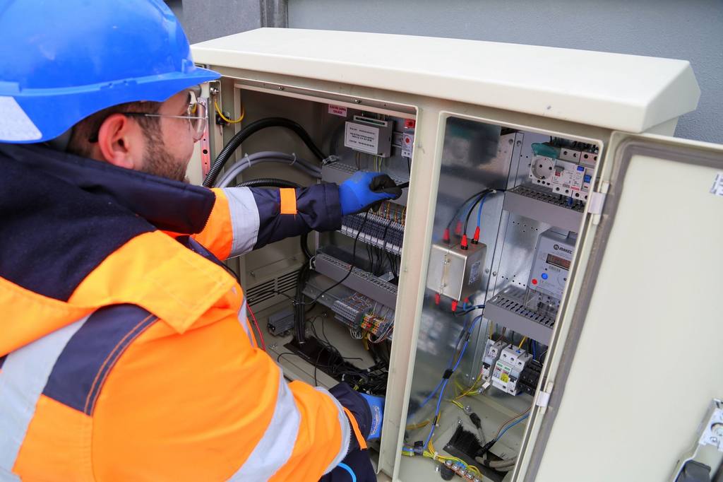Electrician working on a domestic consumer unit
